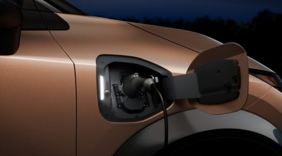 Close-up image of charging cable plugged in | Romeo Nissan in Kingston NY